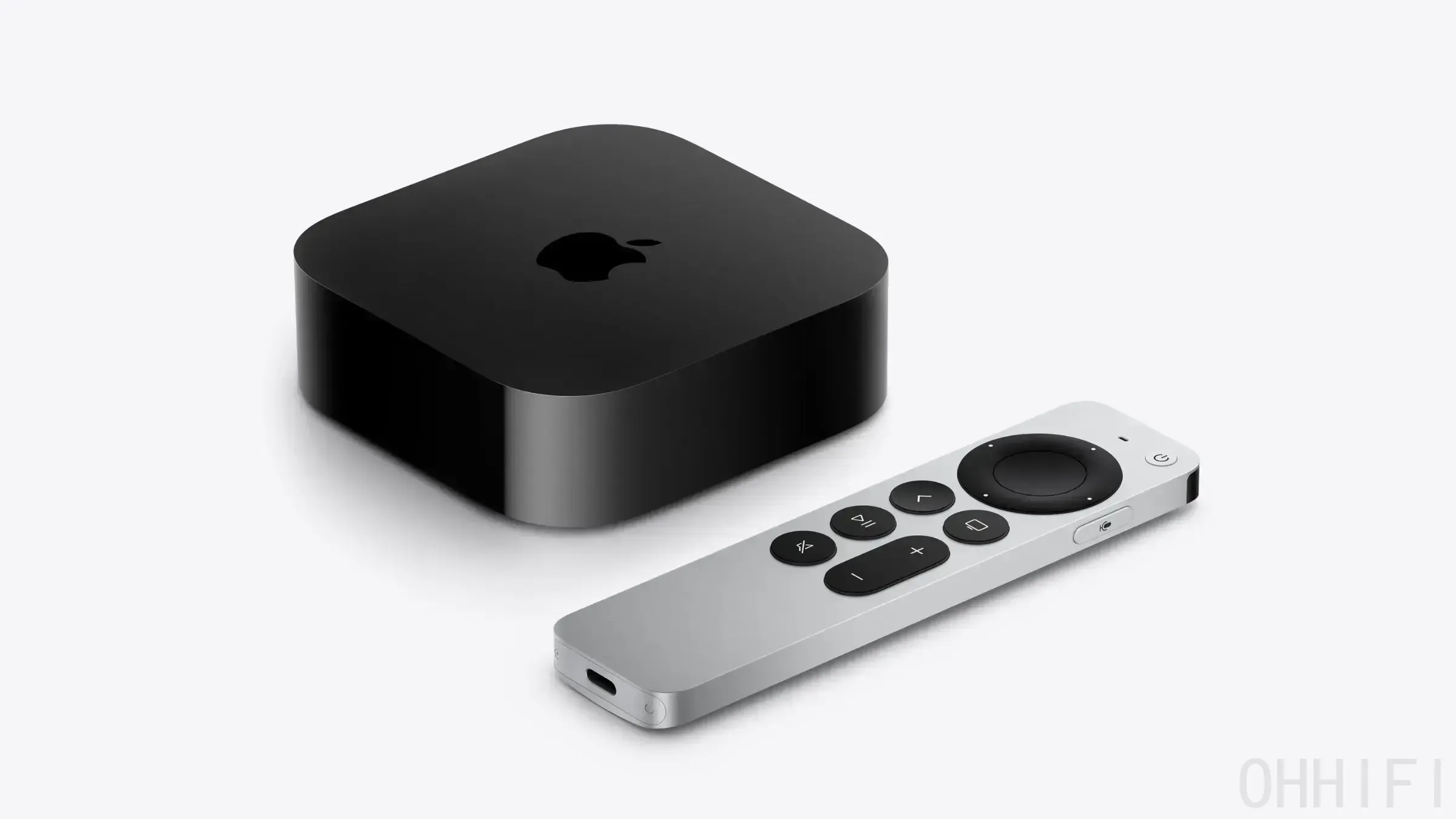 Close-up of the Apple TV 4K box and silver Siri Remote on a plain background, the hardware supported by tvOS 27