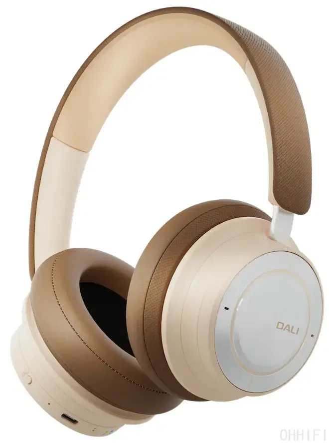DALI IO-8 wireless ANC headphones in Caramel White, studio product shot showing the leather ear pads, woven headband, USB-C port and physical control buttons.