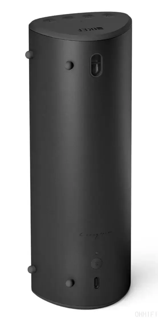 Rear view of the KEF Muo portable Bluetooth speaker in Midnight Black showing the USB-C charging and audio port, Bluetooth pairing button, Ross Lovegrove signature engraving and top-mounted control buttons.