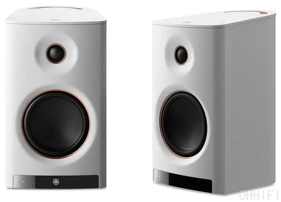 Pair of white Yamaha NX-70A wireless speakers with black drivers, copper trim rings and rounded cabinet design
