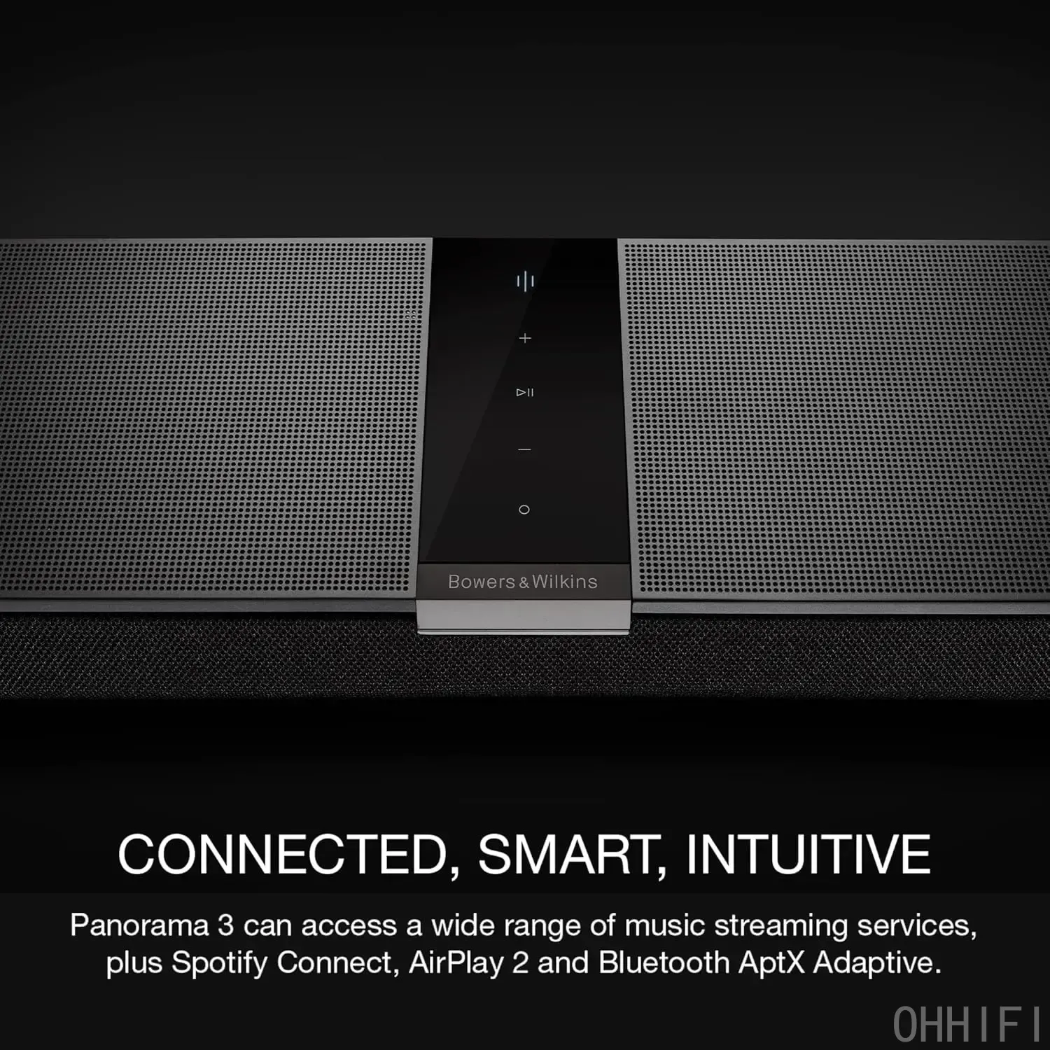 Close-up of the Bowers & Wilkins Panorama 3 soundbar's perforated metal top showing the central capacitive touch controls and brand logo.